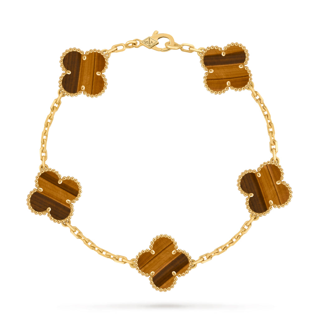 VCA four-leaf clover 5-flower golden bracelet paired with tiger's eye stone