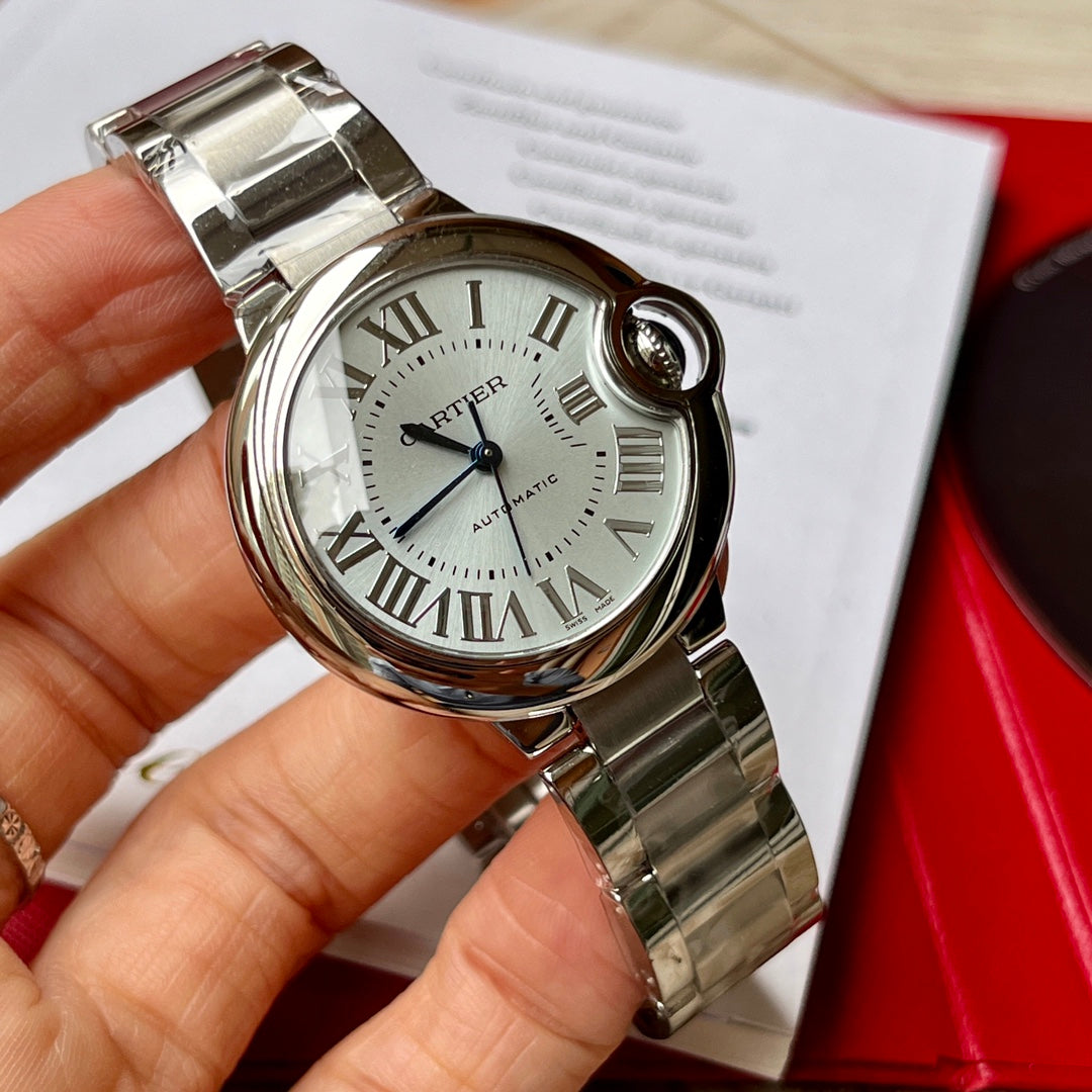 Cartier watch with sapphire crystal face and blue balloon design