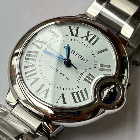 Cartier watch with sapphire crystal face and blue balloon design