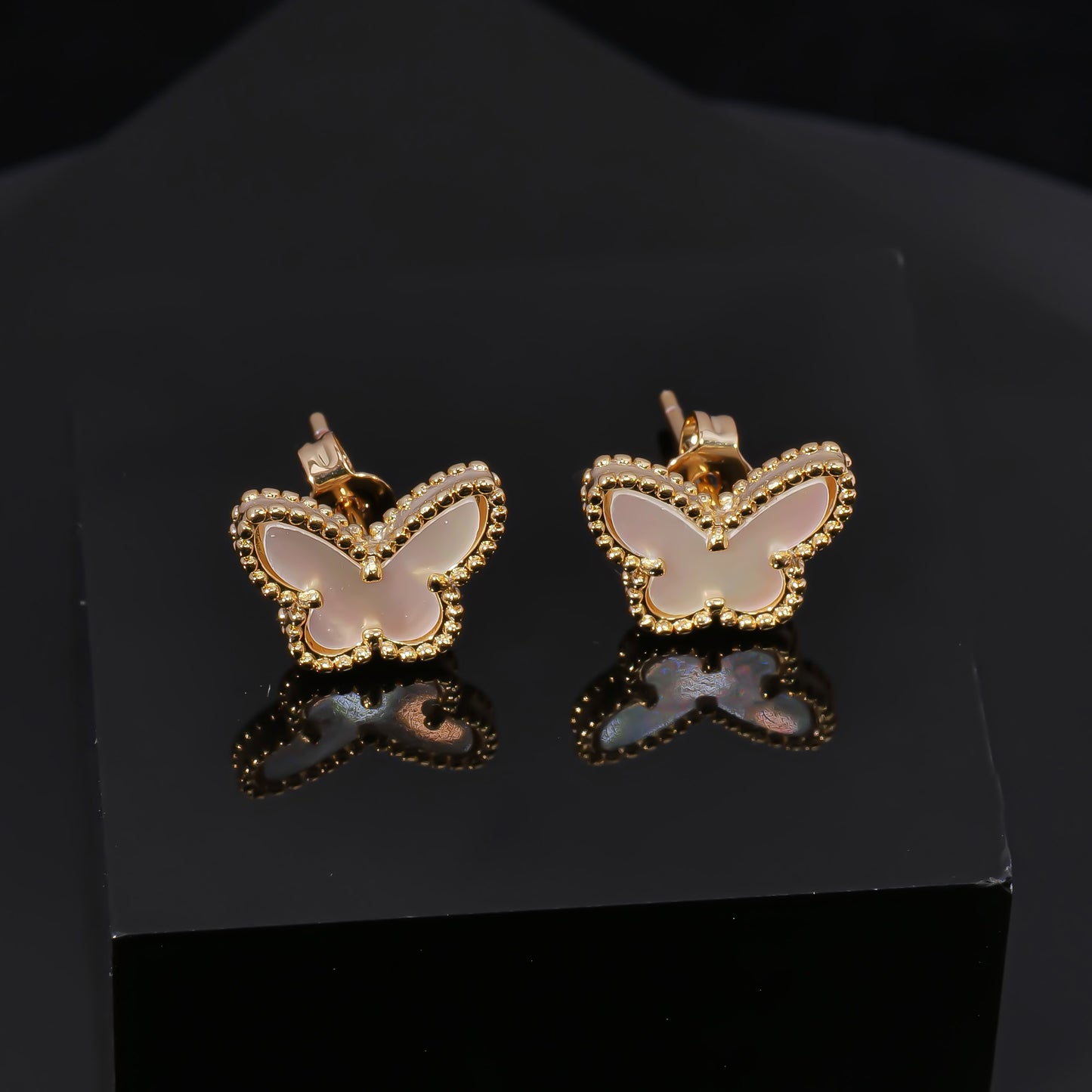 VCA, elegant butterfly-shaped stud earrings