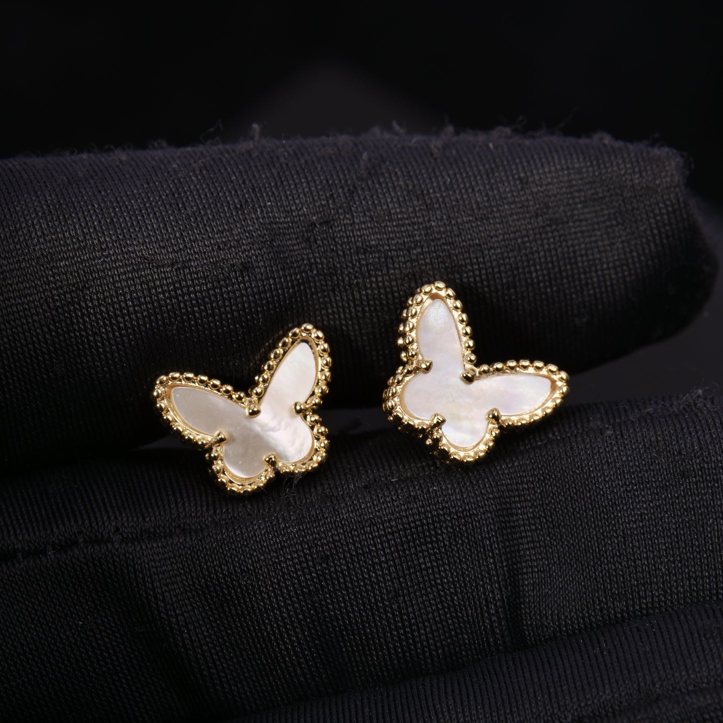 VCA, elegant butterfly-shaped stud earrings