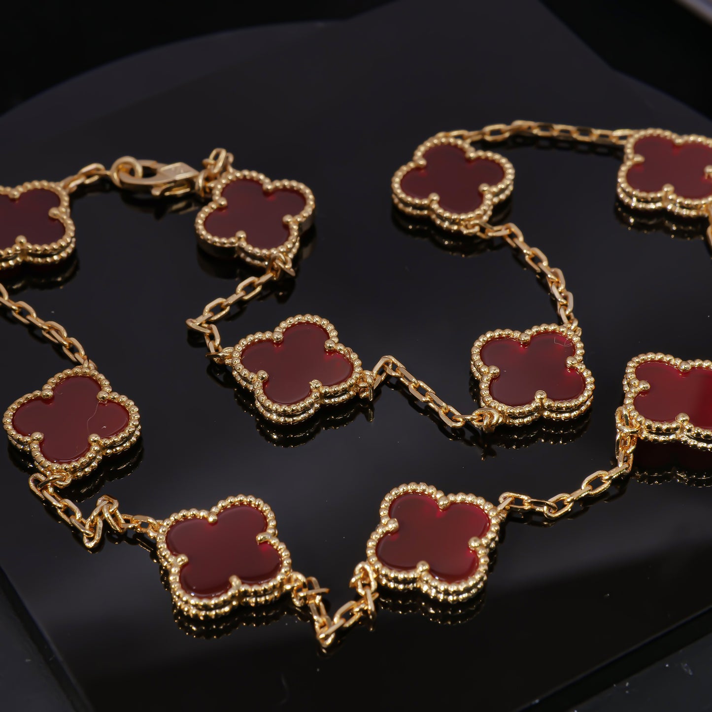 VCA Ten Layers of lucky protection: Luxurious red four-leaf clover layered necklace