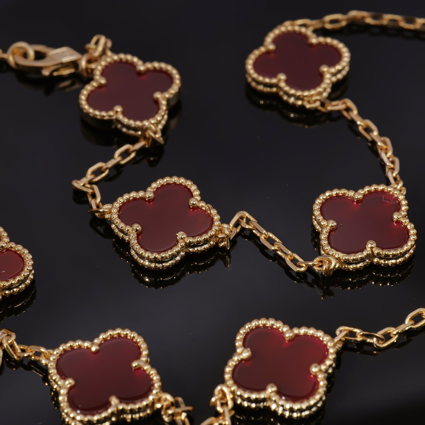 VCA Ten Layers of lucky protection: Luxurious red four-leaf clover layered necklace