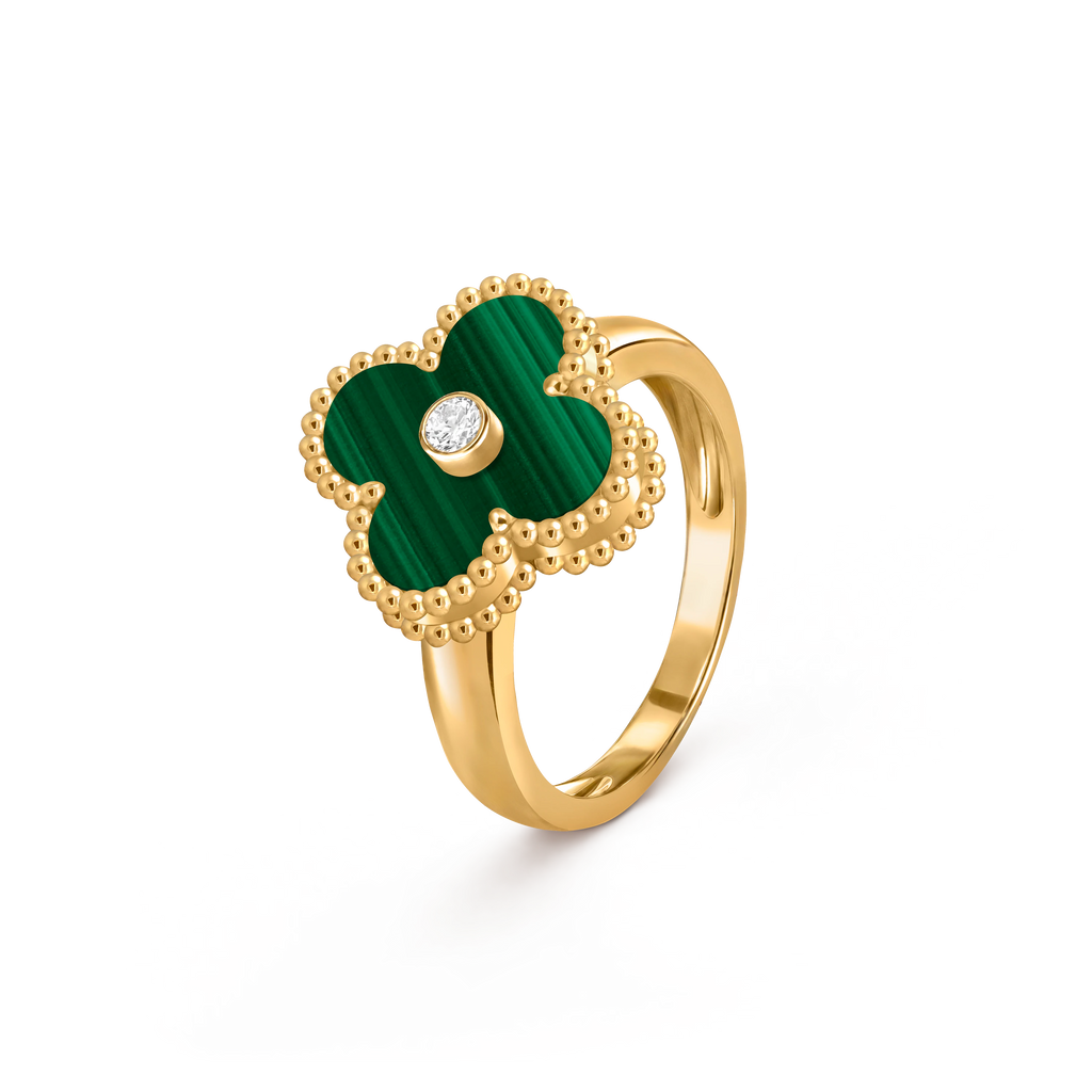 Van Cleef & Arpels gold malachite ring paired with diamond Vintage Alhambra