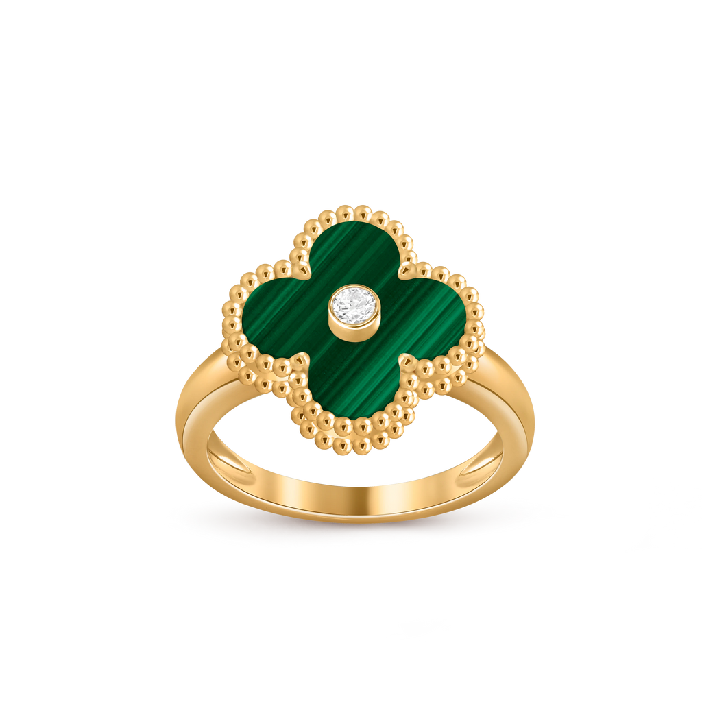 Van Cleef & Arpels gold malachite ring paired with diamond Vintage Alhambra