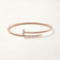 Cartier small nail bracelet rose gold with diamonds on both sides