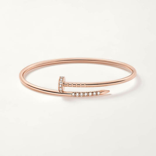 Cartier small nail bracelet rose gold with diamonds on both sides