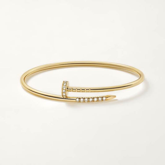 Cartier small 18K gold nail bracelet with diamonds on both sides