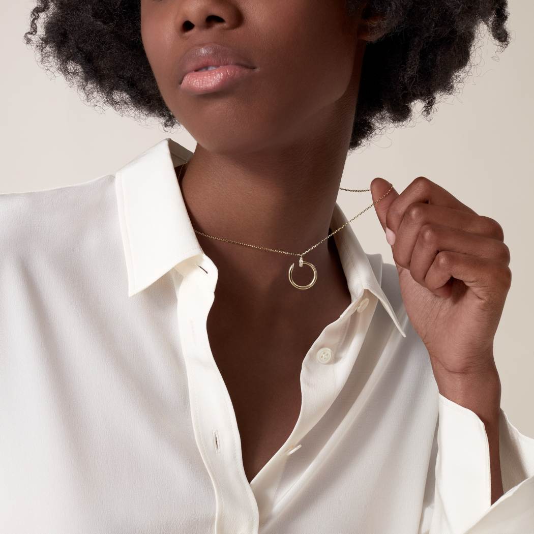 Cartier 18K gold nail pendant paired with a little diamond necklace JUSTE UN CLOU