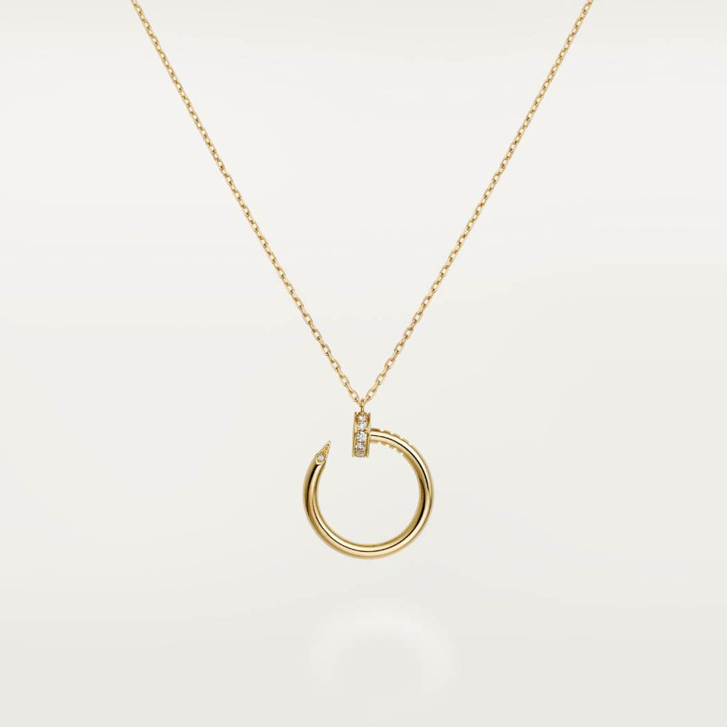 Cartier 18K gold nail pendant paired with a little diamond necklace JUSTE UN CLOU