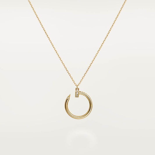 Cartier 18K gold nail pendant paired with a little diamond necklace JUSTE UN CLOU