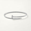 Cartier small 18K white gold nail bracelet with diamonds on both sides