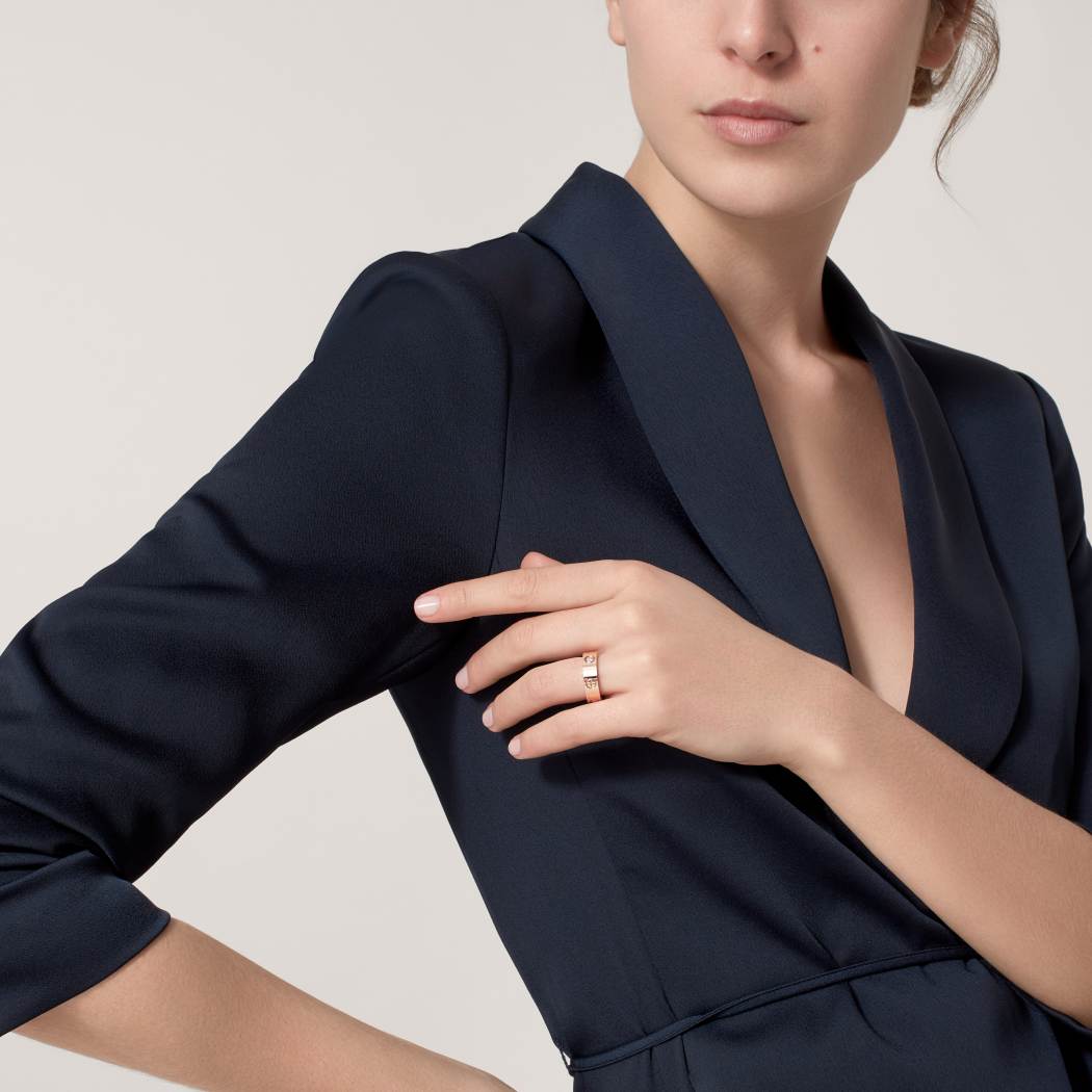 Cartier classic 18K rose gold LOVE ring adorned with three diamonds