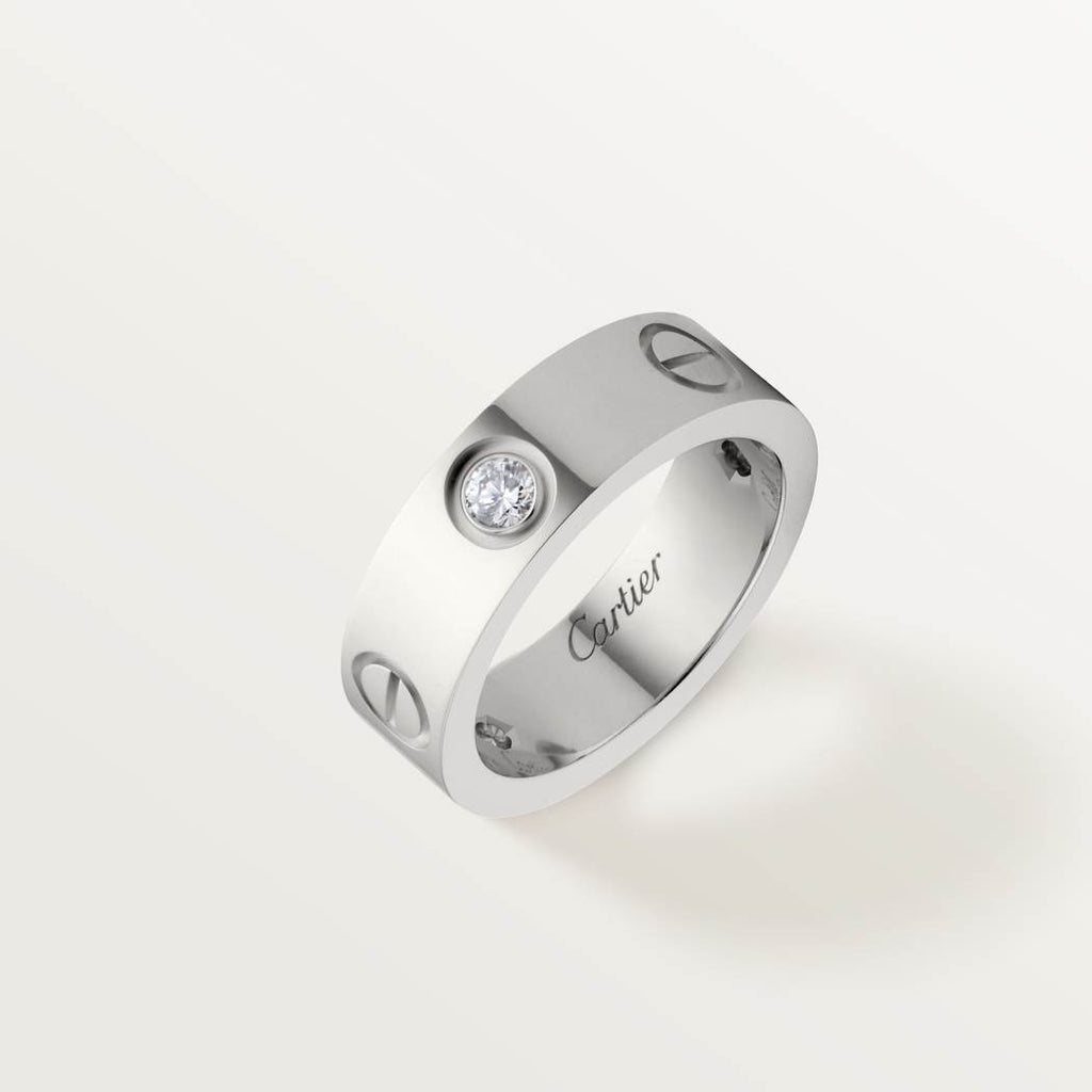 Cartier classic 18K white gold LOVE ring adorned with three diamonds