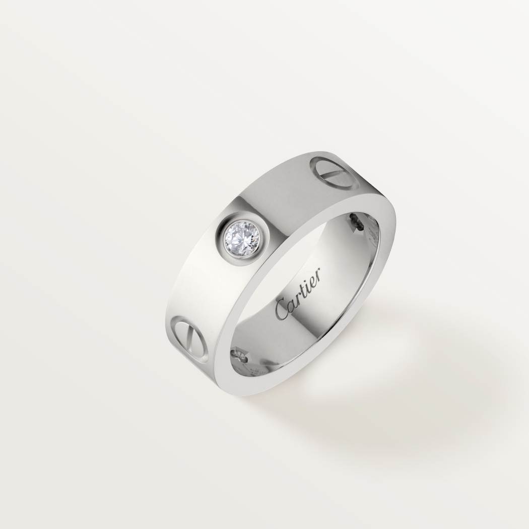 Cartier classic 18K white gold LOVE ring adorned with three diamonds