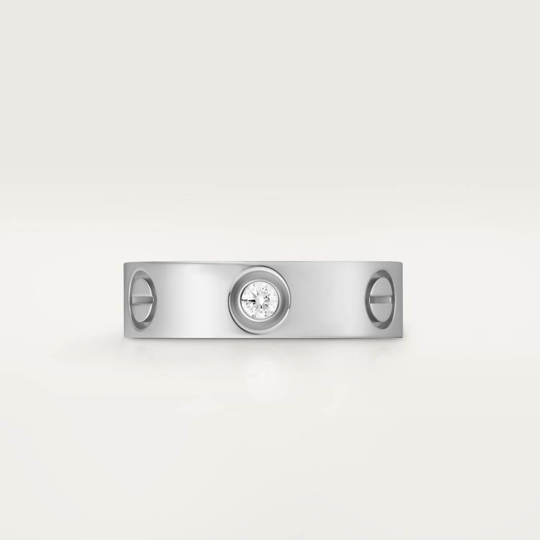 Cartier classic 18K white gold LOVE ring adorned with three diamonds