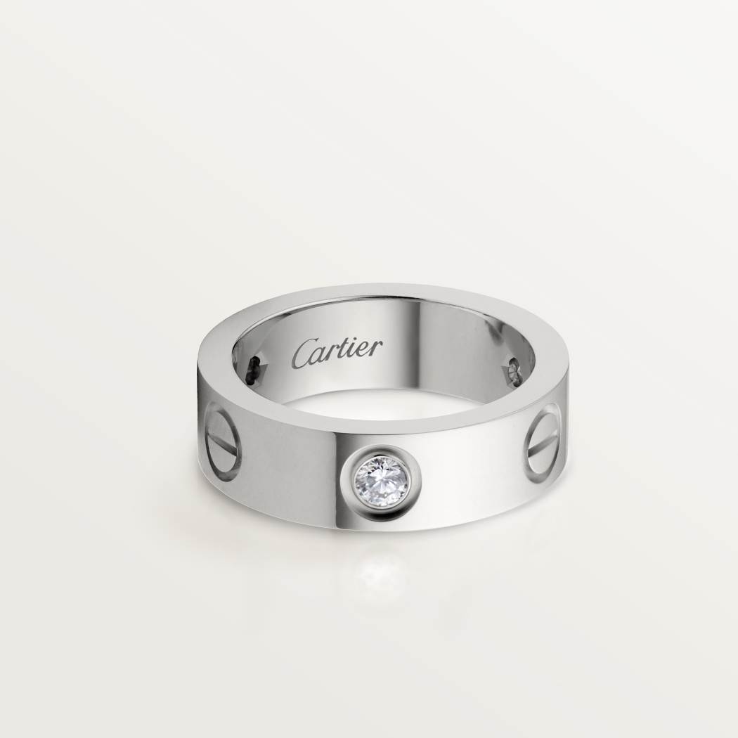 Cartier classic 18K white gold LOVE ring adorned with three diamonds
