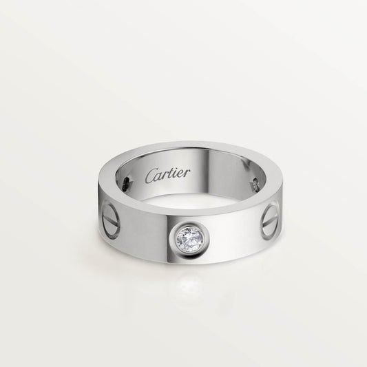 Cartier classic 18K white gold LOVE ring adorned with three diamonds