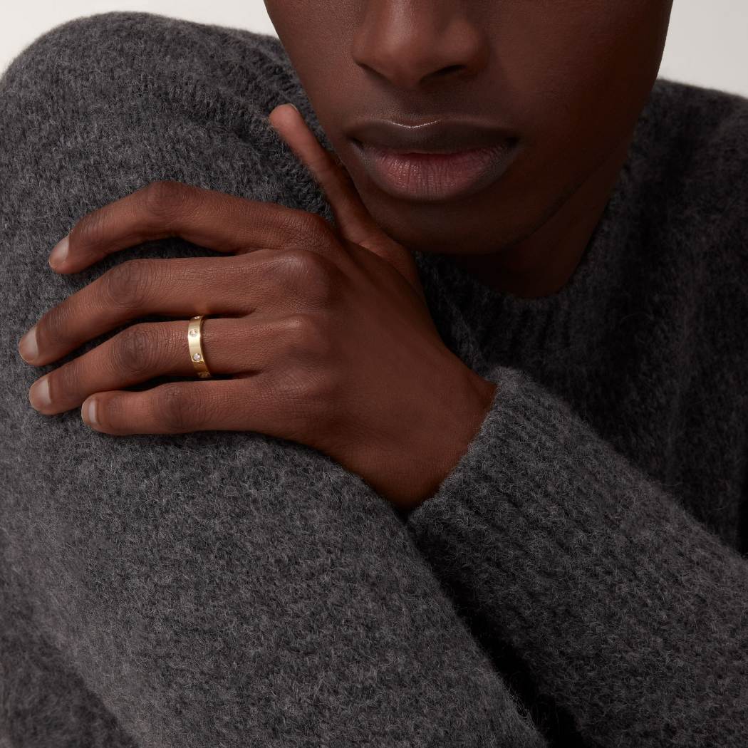 Cartier classic 18K gold LOVE ring adorned with eight diamonds