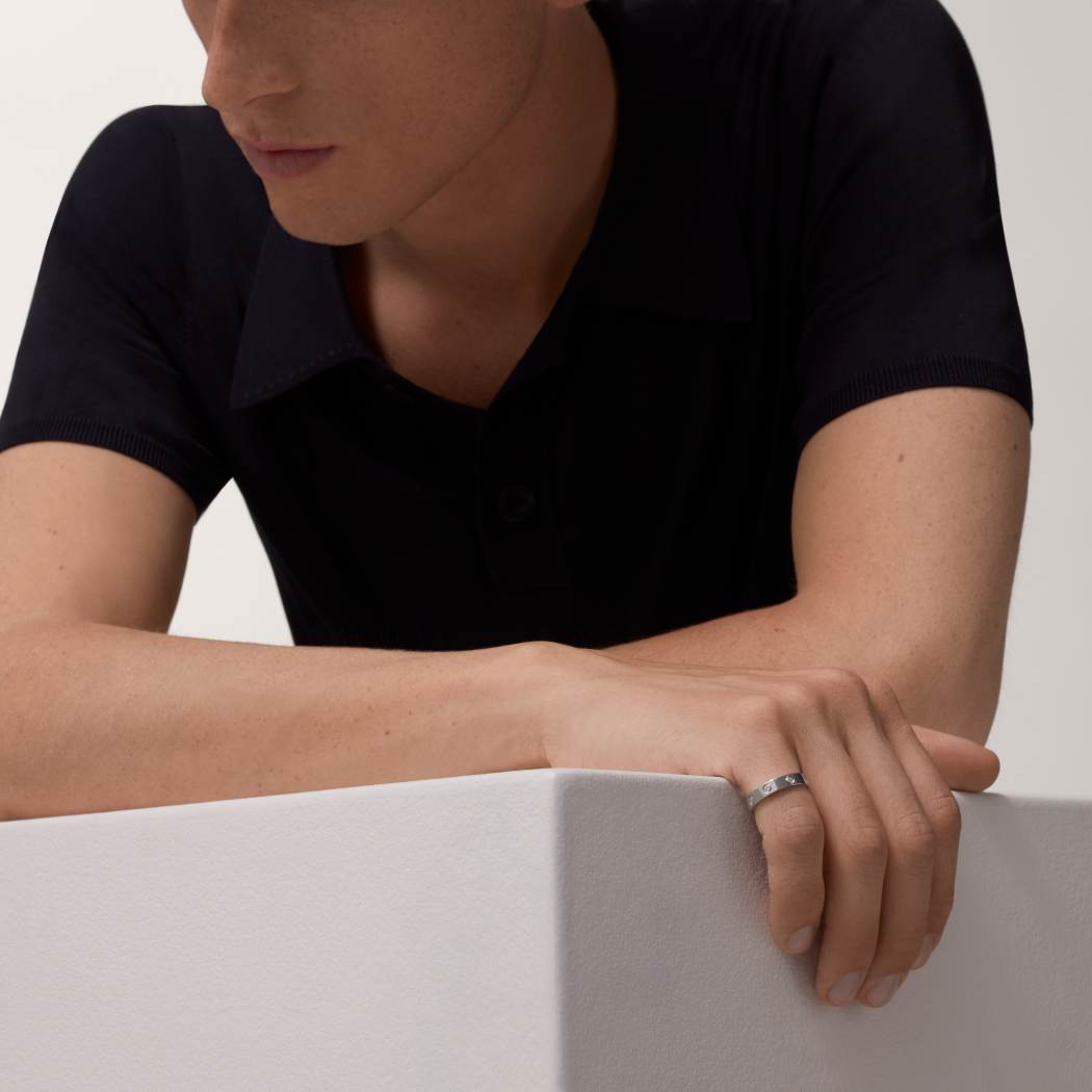 Cartier classic 18K white gold LOVE ring adorned with eight diamonds