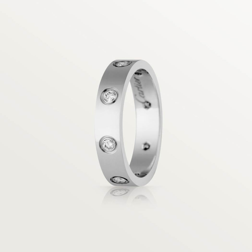 Cartier classic 18K white gold LOVE ring adorned with eight diamonds