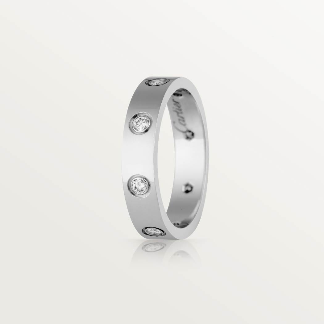 Cartier classic 18K white gold LOVE ring adorned with eight diamonds
