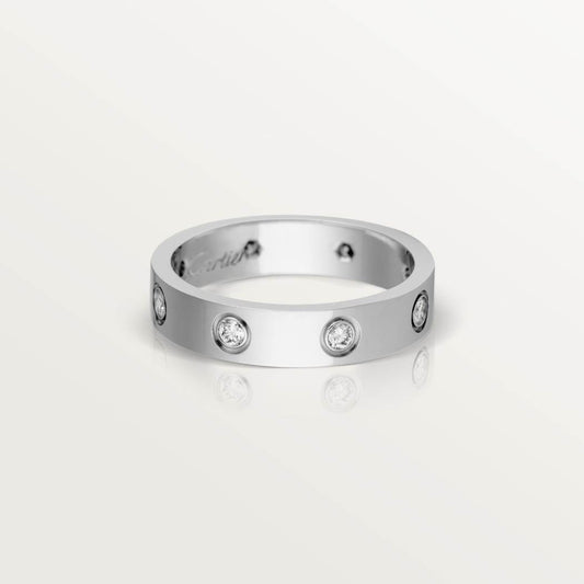 Cartier classic 18K white gold LOVE ring adorned with eight diamonds