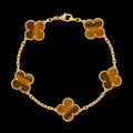 VCA four-leaf clover 5-flower golden bracelet paired with tiger's eye stone